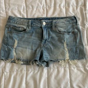 Stretchy low rise denim shorts